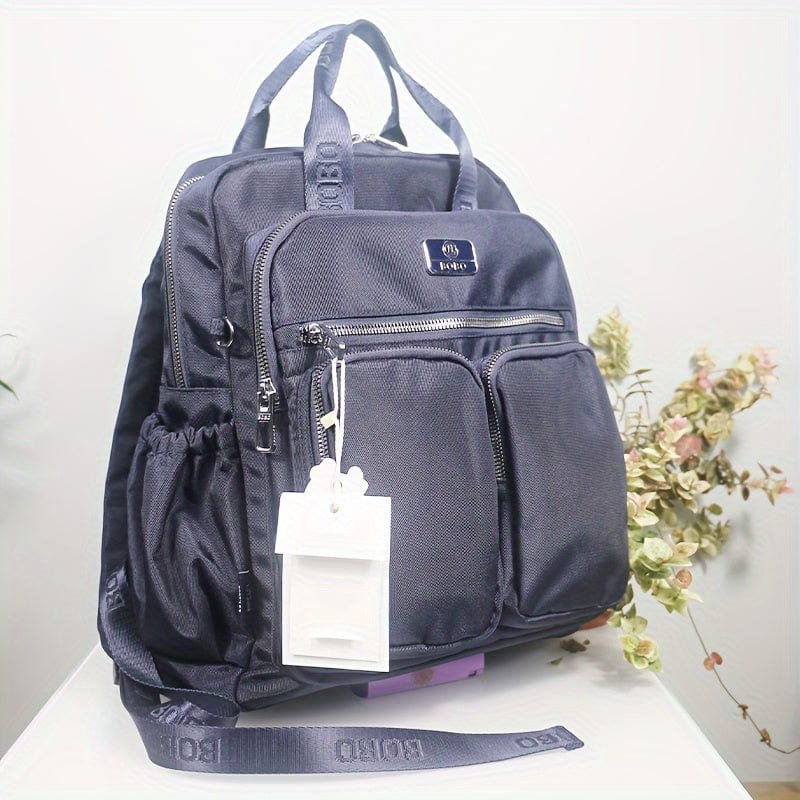 Sac à dos noir pour femme, format compact et design sobre – Image 2